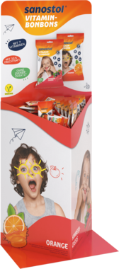 Schüttendisplay für Sanostol Vitamin-Bonbons in Rot-Orange mit Kinder-Motiven und Produktbeuteln.